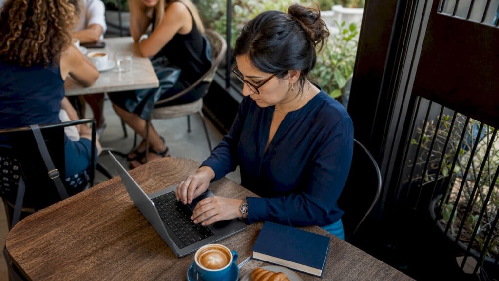 Marketer working on ecommerce SEO strategy at desk